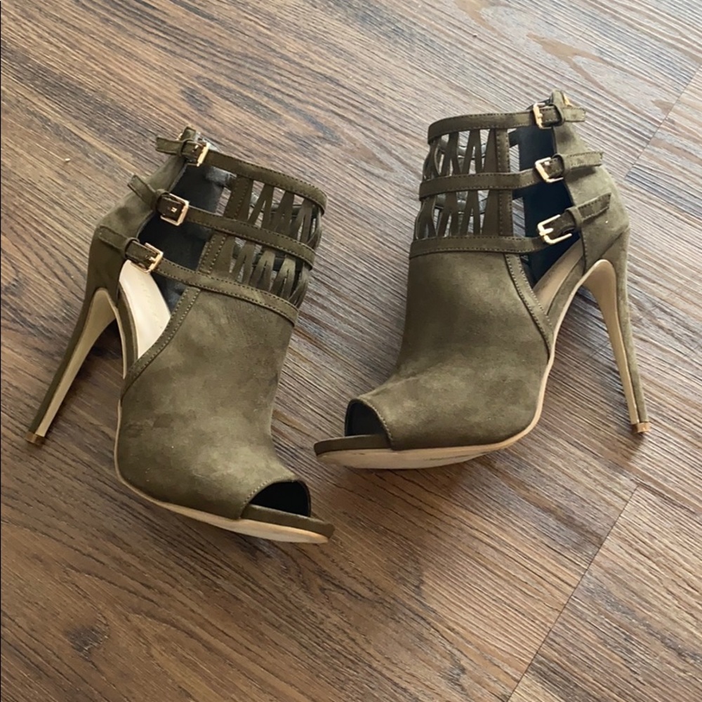 Olive green heels with gold buckles and zipper